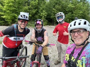 Group shot at Wilderness Tours Bike Park's preak