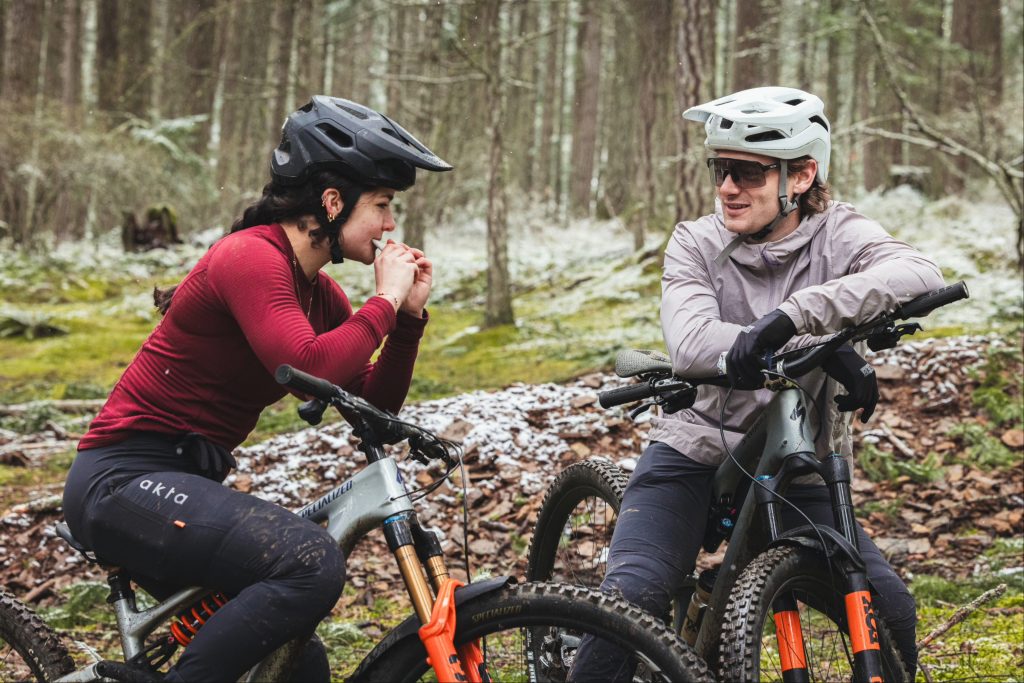 Mountain bikers refuelling with Xact Nutrition.